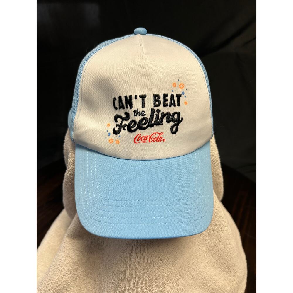 Coca-Cola Blue & White Trucker Hat – “Can’t Beat the Feeling”